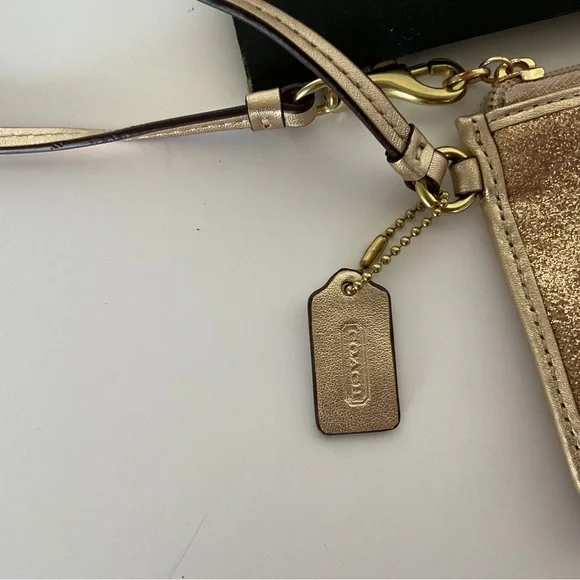 COACH GOLD GLITTER WRISTLET NWT - Picture 5 of 16